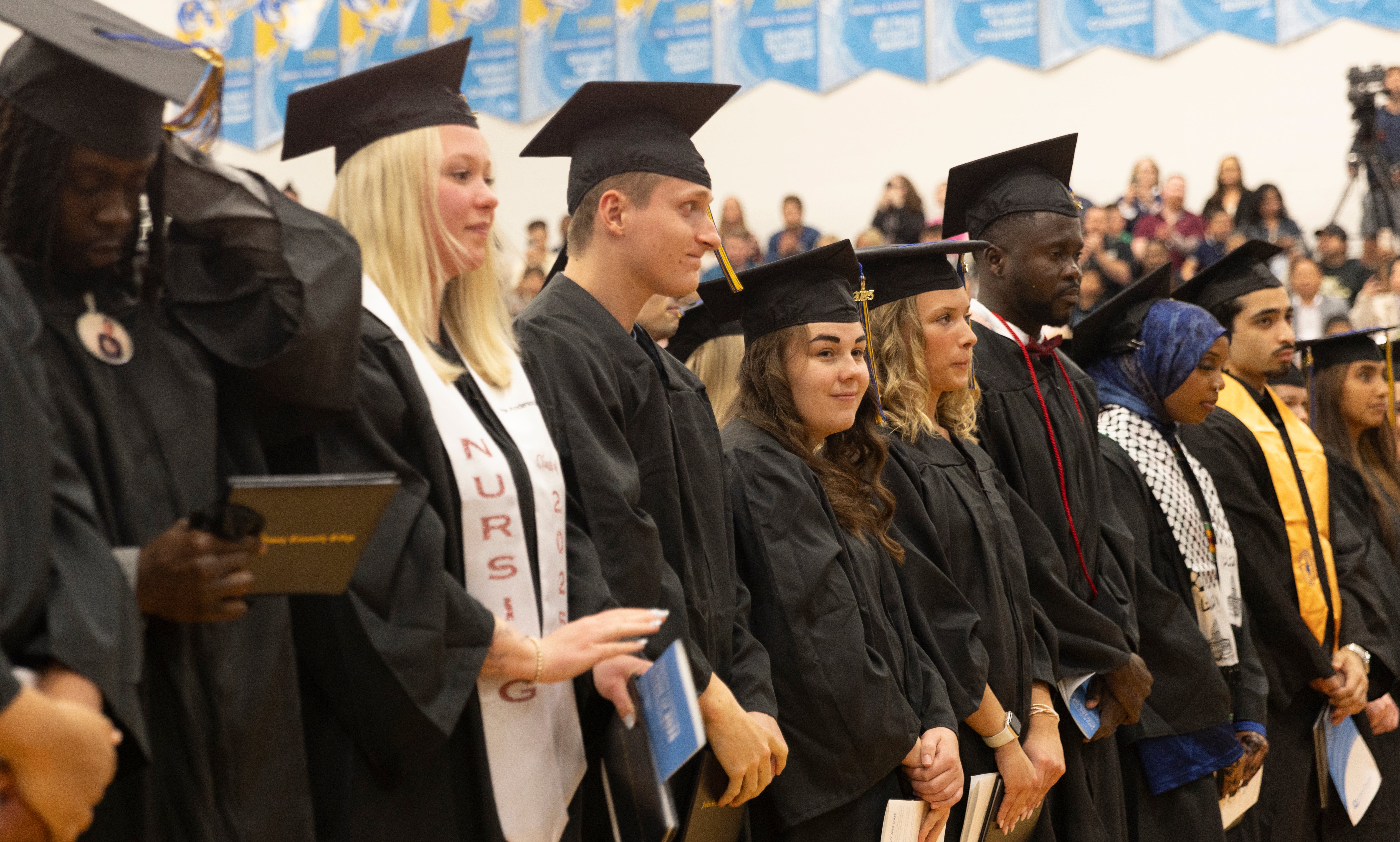 Group of Graduates Stading Coon Rapids Campus