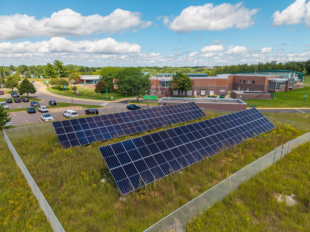 solar panels sitting on sunny hill