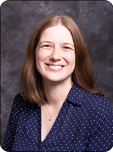 Photo of individual in blue shirt